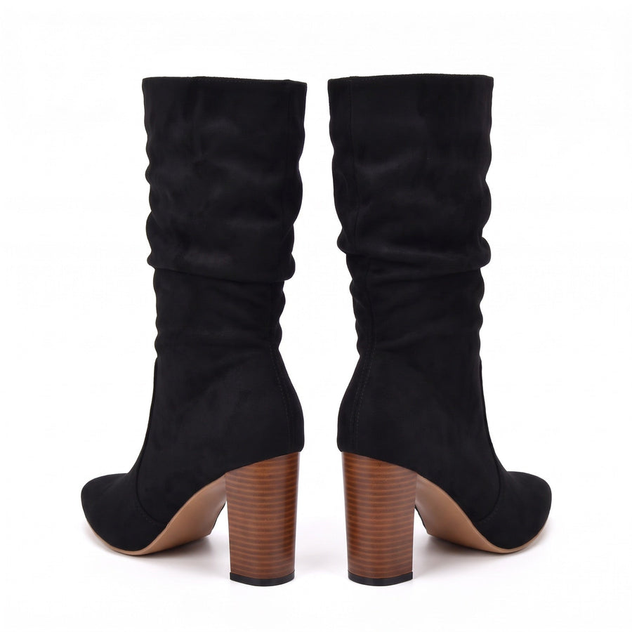 Bruine laarzen combineren: 6 outfits voor dames