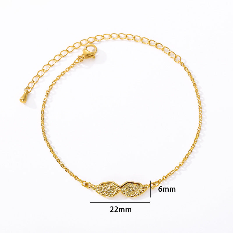 Armband mit Flügel-Anhänger