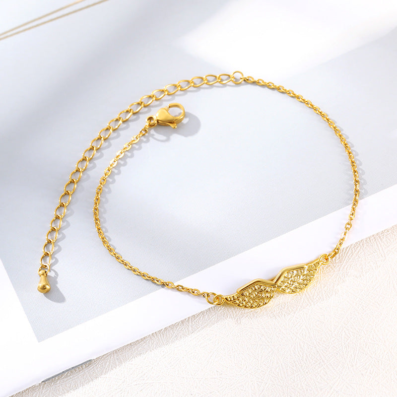 Armband mit Flügel-Anhänger