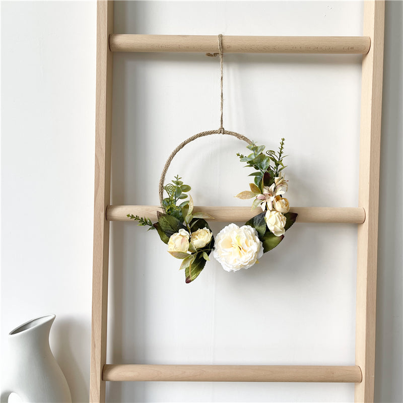 Wandkranz mit Kunstblumen